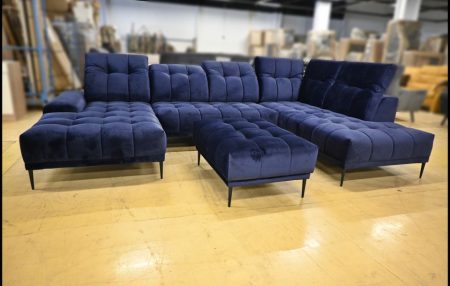 Exxpo Grenada Ecksofa in Blau mit Samtbezug und Hocker