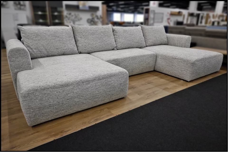 Graue Wohnlandschaft MF4 (188 × 400 × 173 cm) aus Webstoff mit Federkern, Bettfunktion, Bettkasten, Kissen und schwarzen Kunststofffüßen