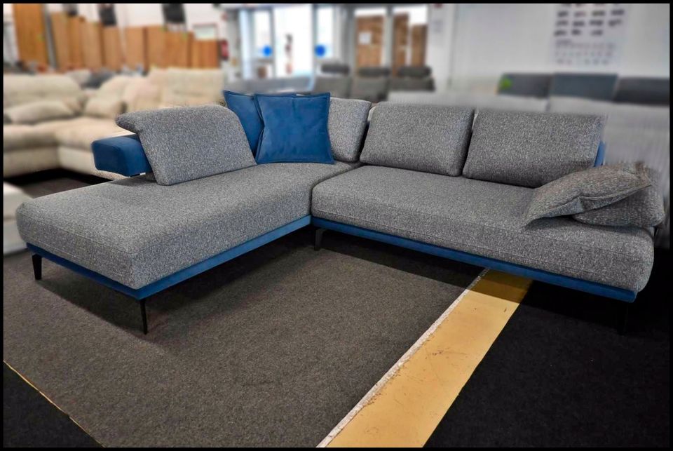 Benix Cookie Ecksofa Grau-Blau mit elektrischer Schlaffunktion
